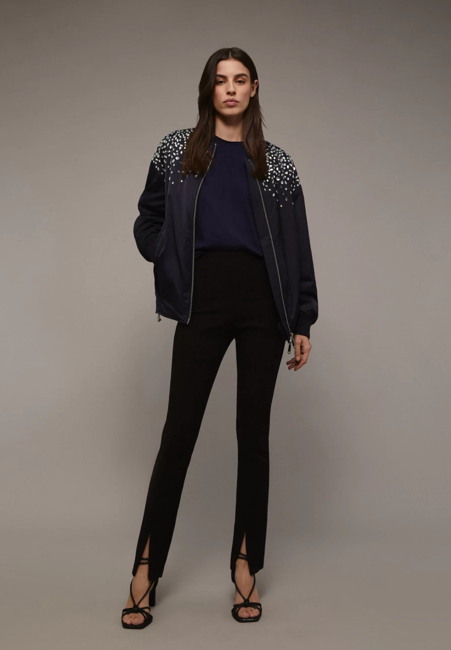 "ScalpersCompany Women's Skinny Trousers with Stylish Slit Detail"