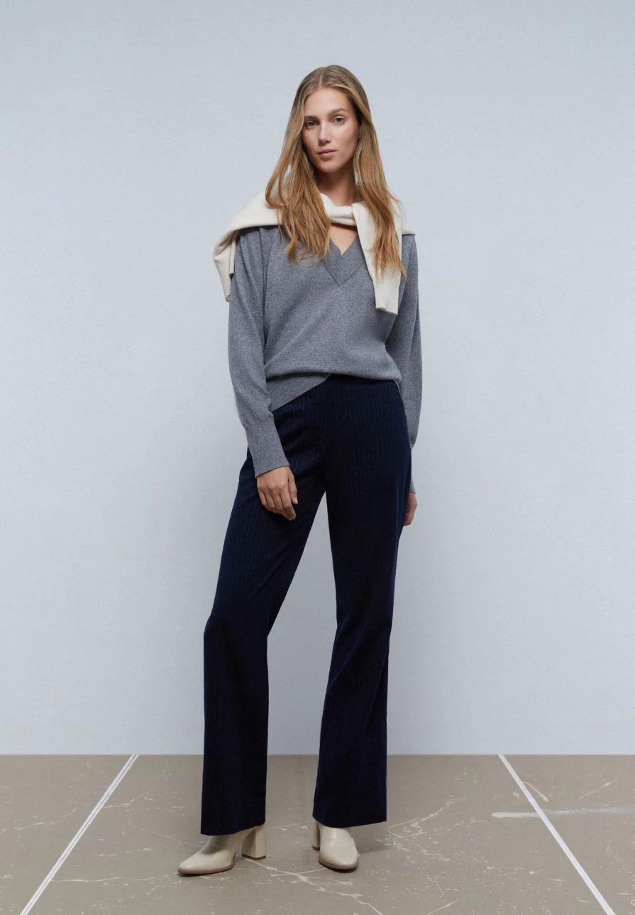"ScalpersCompany Women's Stylish Sweater with Unique Neckline Design"